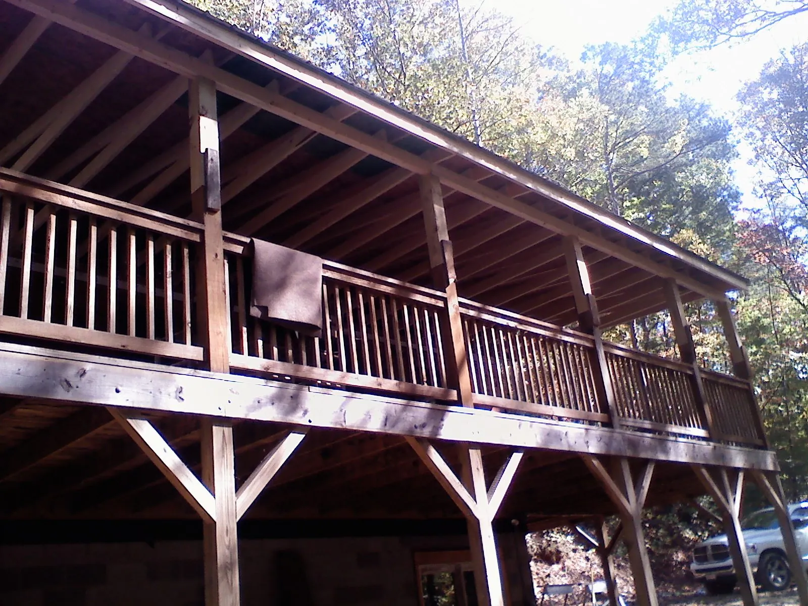 Timber framing under a new elevated porch and deck — Roof Leak Repair in Elbow Lake by Roofing Brothers